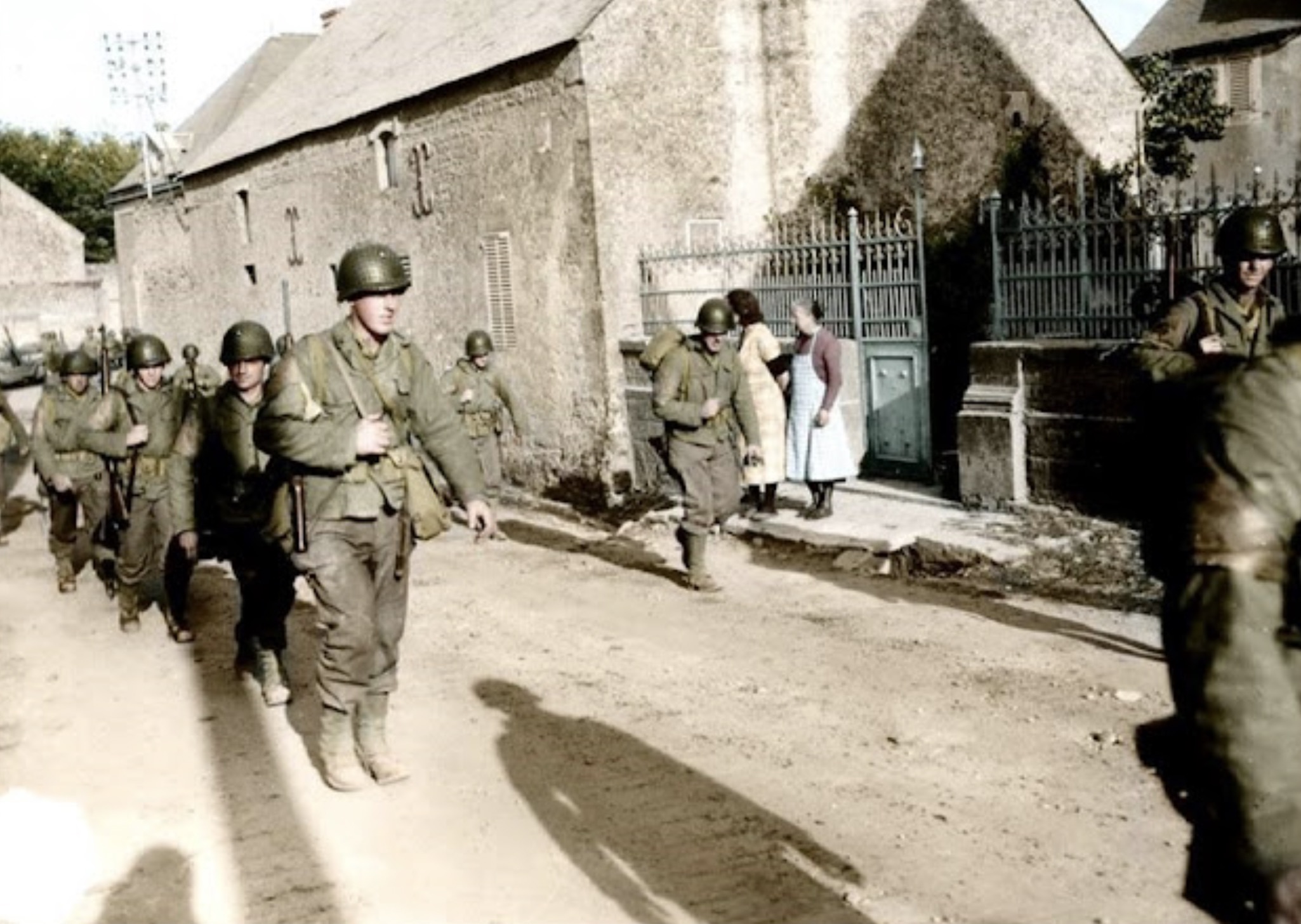 U.S. Army troops of the 2nd Infantry Division in the liberated village of Colleville-Sur-Mer near Omaha Beach 